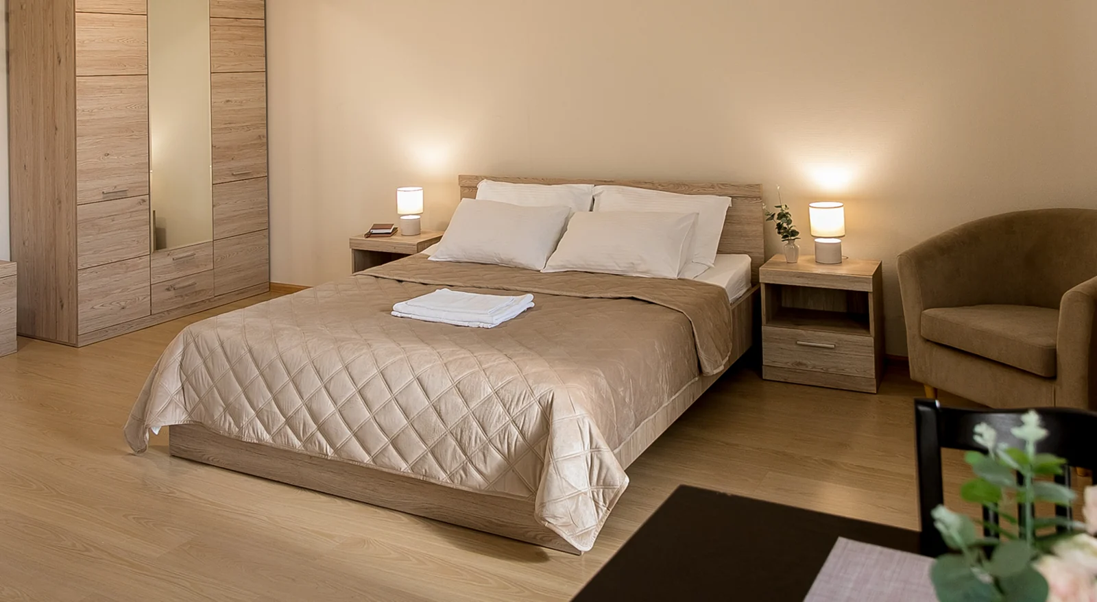 An official image from the short-stay apartment complex at 30 Pobedy Boulevard. Equipment depends on the apartment booked.
